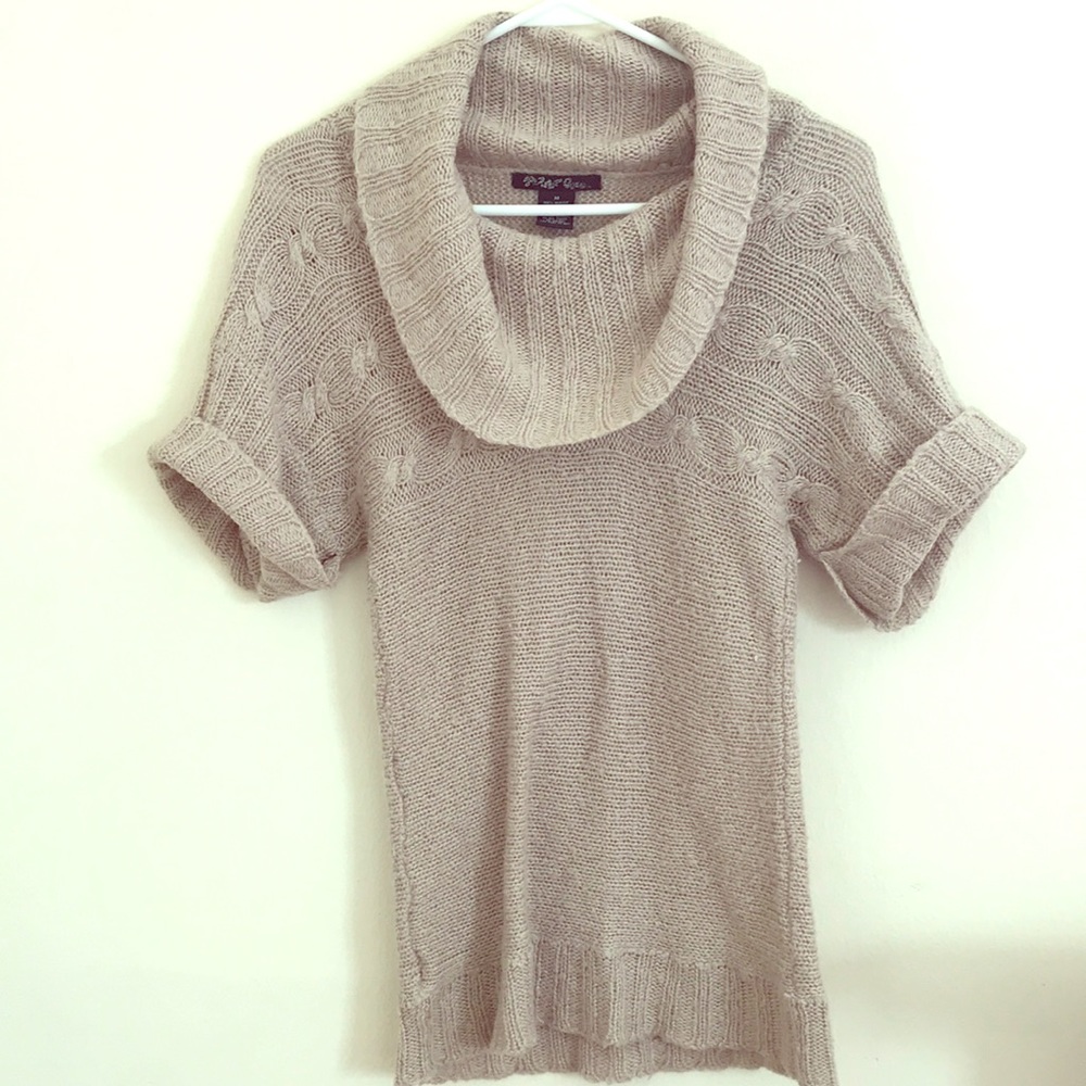 Women’s cowl neck sweater.